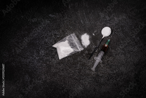 Konstfotografi Syringe with drugs dose on black background