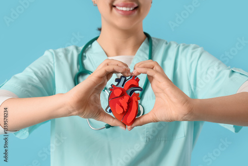 Female doctor with paper he...