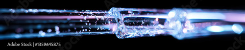 Obraz na płótnie Water Flowing Through Transparent Tubing with Internal Illumination w salonie