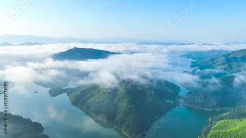 Soar Above the Breathtaking Landscape of Anhui, Where Verdant Mountains Rise Through a Mesmerizing Cloud Sea