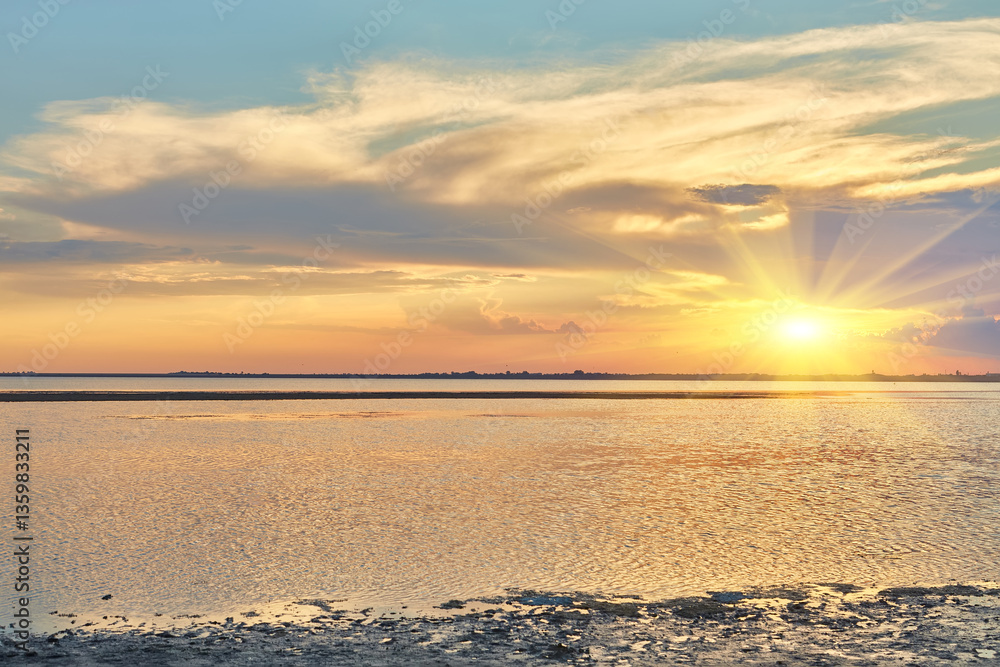 Fototapeta premium Sunset Sky and Reflections on Calm Water