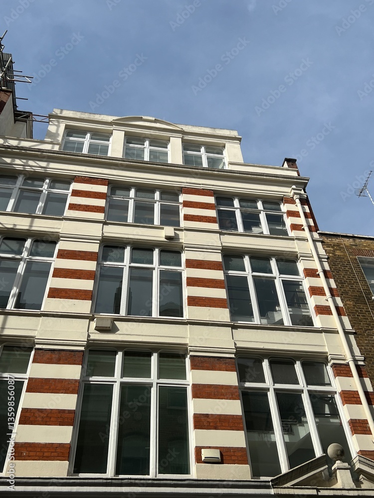 Fototapeta premium Tall building with red brick