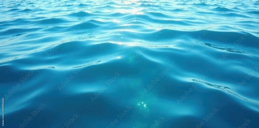 Naklejka premium Soft blue water surface with gentle wave ripples and subtle ocean swells, serene, waves, peaceful