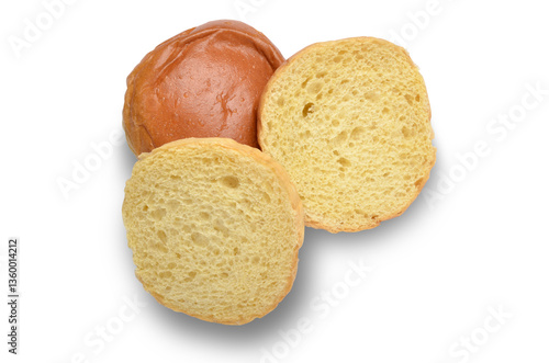 Two whole Brioche Buns top view one sliced open isolated on white