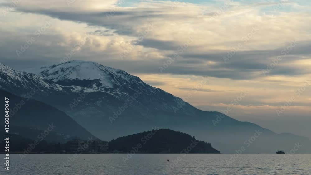 Boat Sailing to the Mountains with Seagulls Flying Above a Serene Lake Boat Sailing to the Mountains with Seagulls Flying Above a Serene Lake