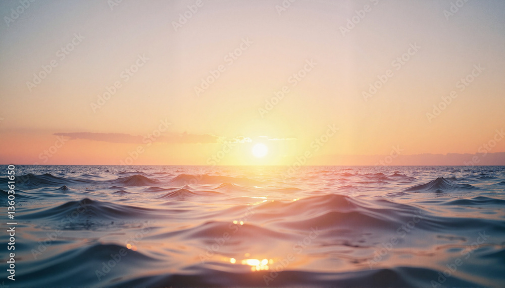Obraz premium Ocean waves reflecting sunset light in tranquil waters 