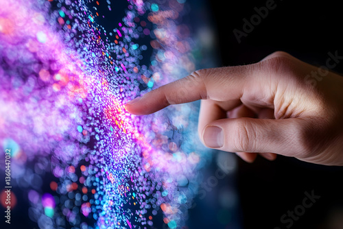 Finger interacting with vibrant digital data display