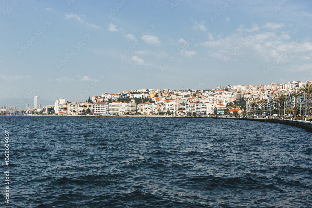 izmir bay with many colorful buildings and mediterranean waters on windy day izmir bay with many colorful buildings and mediterranean waters on windy day