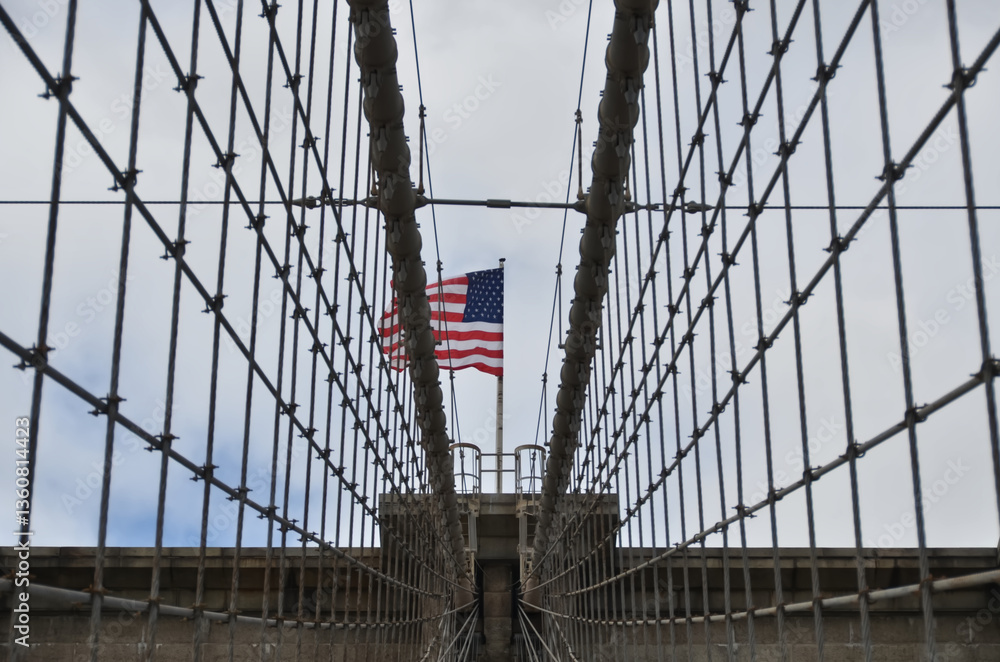 Obraz premium Suspension Bridge with American Flag