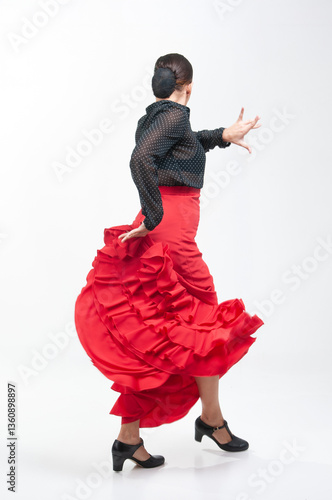 Spanish flamenco dancer in traditional dress isolated on white background for the April Fair 
