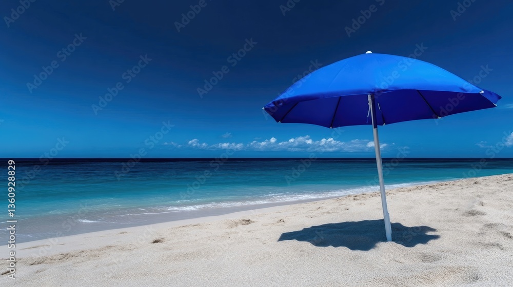 Blue beach umbrella on pristine white sand. Tranquil turquoise ocean Blue beach umbrella on pristine white sand. Tranquil turquoise ocean