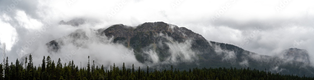 Panorama of mountains and treeline with mist and clouds including transparent areas
Panorama of mountains and treeline with mist and clouds including transparent areas