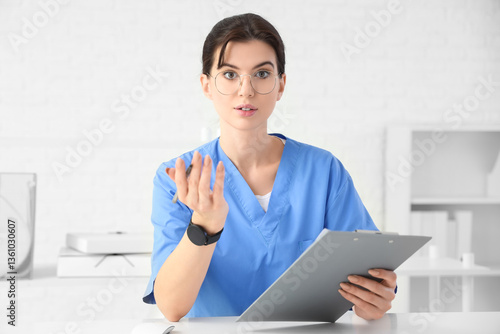 Female doctor video chattin...