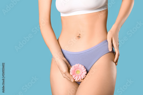 Young woman in panties with...