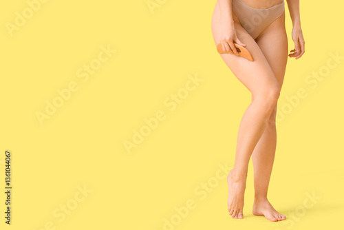 Young woman in underwear ma...
