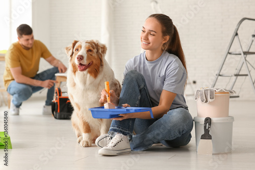 Young couple with cute dog ...