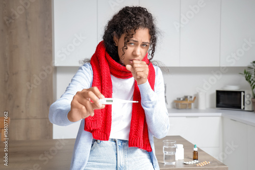 Sick African-American woman...
