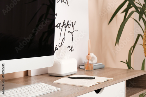 Notebook with pen on desk i...