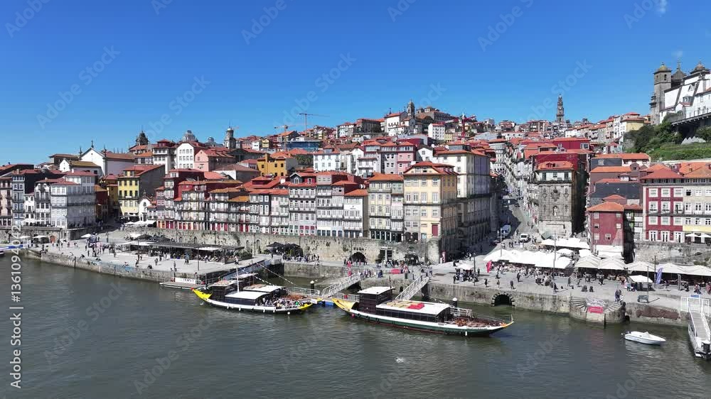 Ribeira Pier At Porto In District Of Porto Portugal. Downtown District. Medieval Buildings. Historical City Scene. Ribeira Pier At District Of Porto In Portugal. Tourism Landmarks. Ribeira Pier At Porto In District Of Porto Portugal. Downtown District. Medieval Buildings. Historical City Scene. Ribeira Pier At District Of Porto In Portugal. Tourism Landmarks.