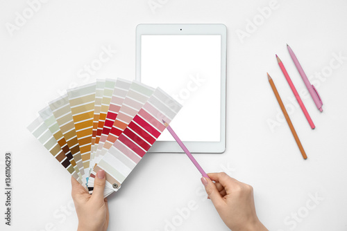 Female hands with paint col...
