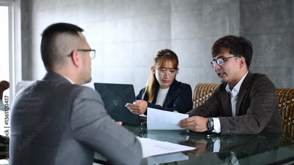 The CEO, senior executives and secretary are having a meeting to discuss the company's stocks and sales. The CEO, senior executives and secretary are having a meeting to discuss the company's stocks and sales.