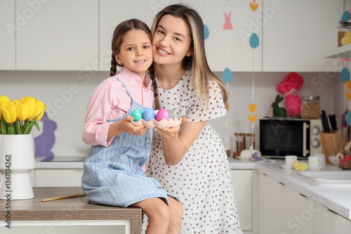 Happy mother and her cute l...