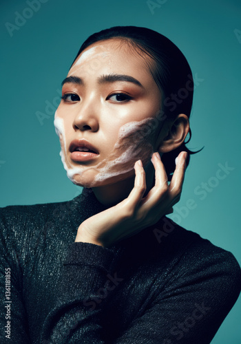 Artistic Skincare Concept with Cream on Woman’s Face