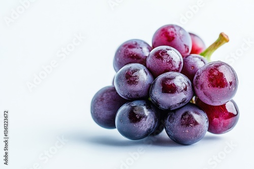 A Close Up Shot Of Fresh Purple Grapes On White Background