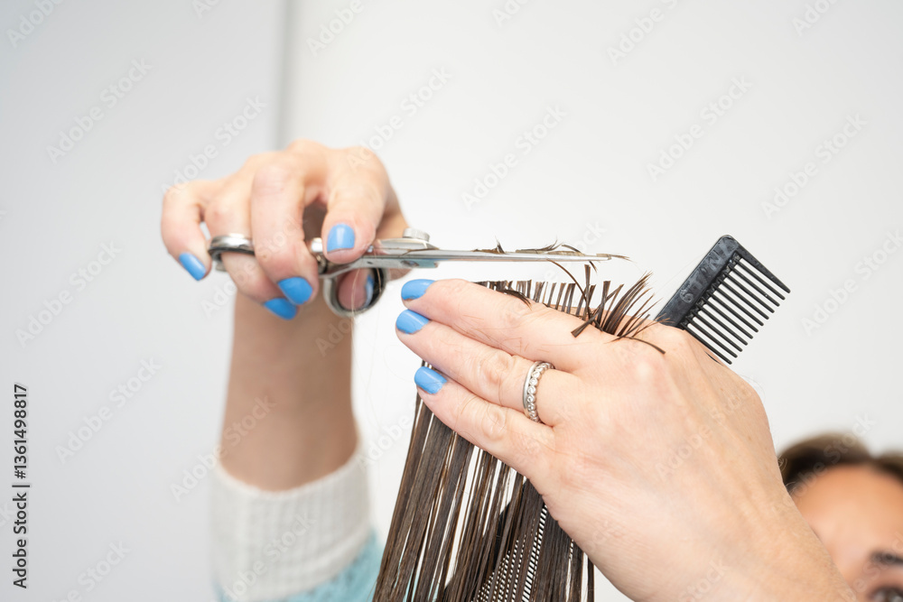 Fototapeta premium hands giving hair cut in woman owned business