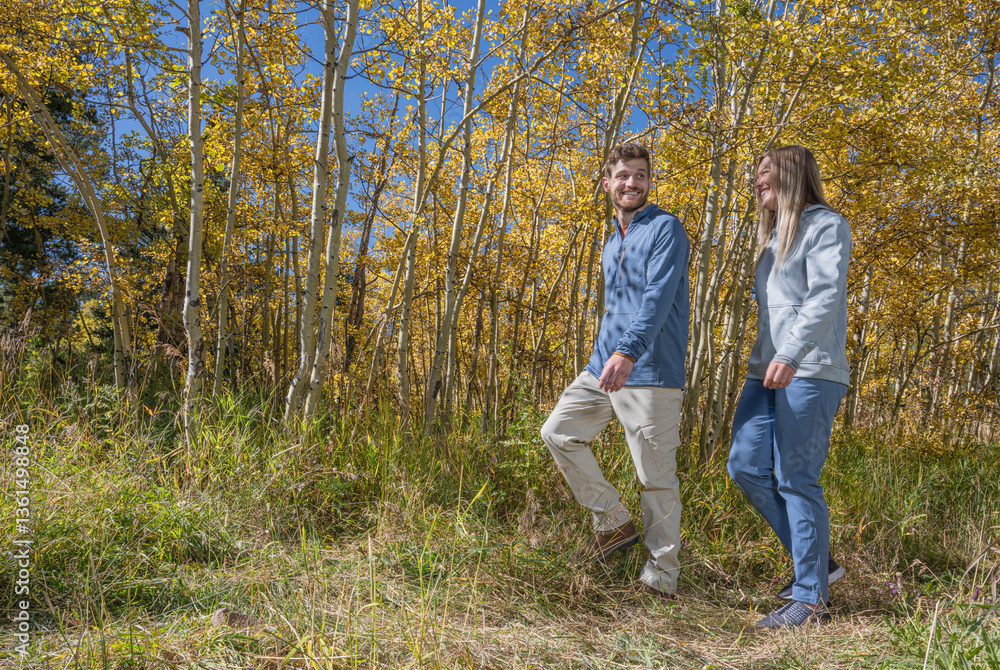 Man and woman hike in Colorado Fall Man and woman hike in Colorado Fall