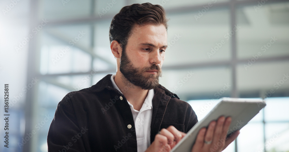Scroll, creative and business man with tablet in office for networking or social media marketer online. Technology, startup and serious worker reading email, campaign and brand promotion on platform Scroll, creative and business man with tablet in office for networking or social media marketer online. Technology, startup and serious worker reading email, campaign and brand promotion on platform