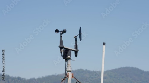 Weather station on blue sky background.