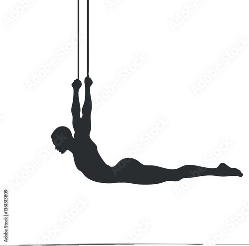 Silhouette of an aerial gymnast performing on trapeze, ideal for fitness and performance themes.