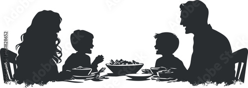 Family silhouette enjoying dinner together, ideal for themes of togetherness and bonding.