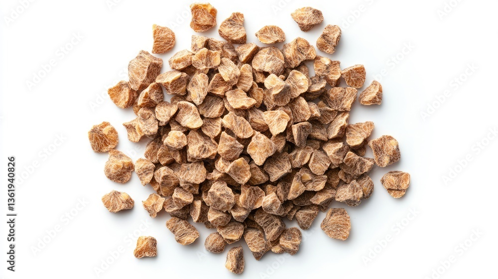 Obraz premium A close-up view of a pile of brown seeds on a white background, showcasing their texture and natural color