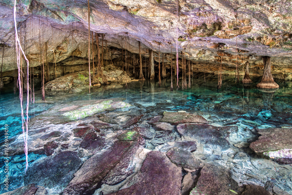 A cenote in a cave used by Maya as a sacred worship place, Yucatan peninsula, Mexico