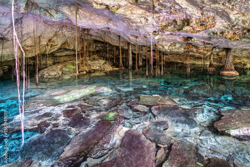 Obraz na płótnie A cenote in a cave used by Maya as a sacred worship place, Yucatan peninsula, Mexico w salonie