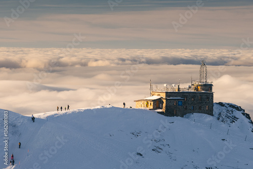 Snow-covered peaks of the Tatra Mountains with Kasprowy Wierch in winter. Stunning alpine scenery, perfect for skiing, hiking, and photography. Cold, crisp air and breathtaking views