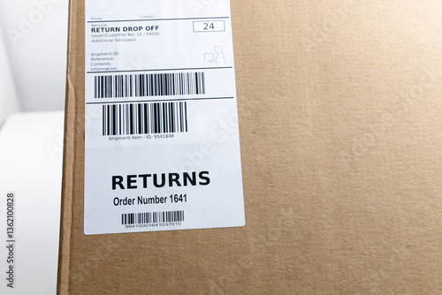 Packaging with return label and barcode for returning