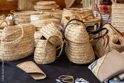 Handwoven Straw Bags and Accessories at a Craft Market