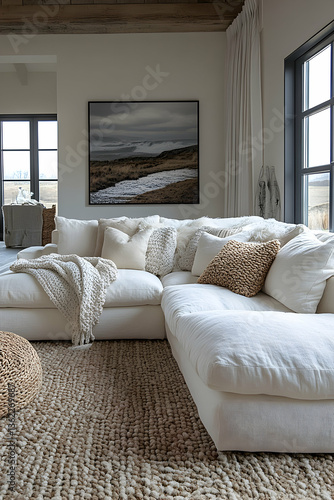 Cozy living room featuring a large sectional sofa with throw blankets and decorative pillows