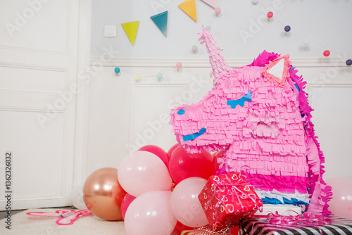 Obraz na płótnie Bright party decor feature cheerful unicorn pinata and balloons w salonie