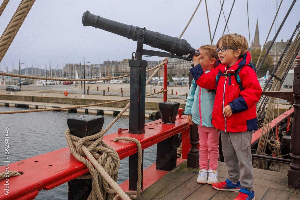 Kids in colorful jackets enjoy maritime adventure at Saint Malo