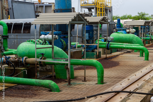 Bild auf Leinwand Industrial sea water pumps and green sea water pipes at chlorine plant of powerp