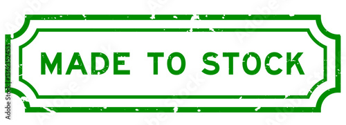 Grunge green made to stock word rubber seal stamp on white background