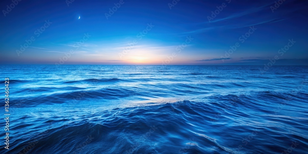 Obraz premium Serene Waters Meet the Horizon Under a Sky Painted with Hues of Twilight and a Crescent Moon