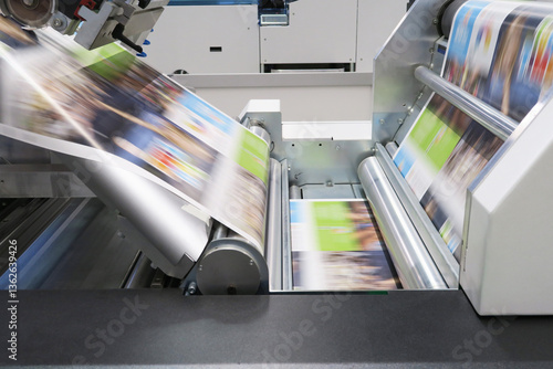 Industrial colors printing machine working on continuing reels of paper with modern inkjet technology