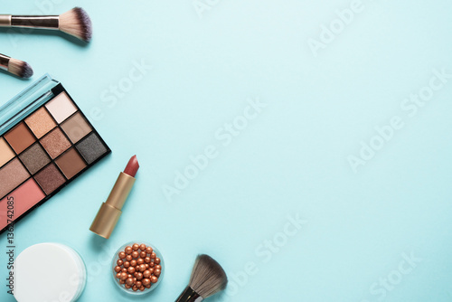 Make up products on blue background.