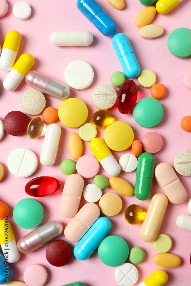 Various pills on color background, top view Various pills on color background, top view