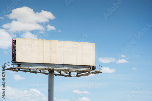 White blank billboard against sky photo